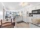 Bright kitchen with white cabinets, granite countertops, and ocean view at 5601 North Ocean Blvd. # B-312, Myrtle Beach, SC 29577