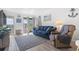 Bright living room with ocean view balcony access, comfy seating at 5601 North Ocean Blvd. # B-312, Myrtle Beach, SC 29577