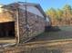 View of brick house showing attached open garage and brick exterior at 5944 Rose Hill Rd., Georgetown, SC 29440