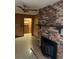 Living room with a brick fireplace and ceiling fan at 5944 Rose Hill Rd., Georgetown, SC 29440