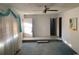 Bright living room with a ceiling fan, hardwood floors, and an open layout at 5944 Rose Hill Rd., Georgetown, SC 29440
