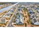 Aerial view of a neighborhood that offers a waterfront lifestyle with well-maintained landscaping at 5960 Bolsena Place, Myrtle Beach, SC 29577