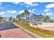Welcome to Waterside Pointe, a beautiful community with palm tree-lined streets and well-maintained landscaping at 5960 Bolsena Place, Myrtle Beach, SC 29577