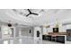 A modern kitchen with stainless steel appliances and a large island at 5960 Bolsena Place, Myrtle Beach, SC 29577