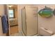 Bathroom featuring a shower, toilet, and view into the bedroom at 601 N Hillside Dr. # 3634, North Myrtle Beach, SC 29582