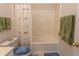 Bathroom with tub shower, and sea-themed curtain at 601 N Hillside Dr. # 3634, North Myrtle Beach, SC 29582