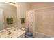 Bathroom with tub shower, and sea-themed curtain at 601 N Hillside Dr. # 3634, North Myrtle Beach, SC 29582