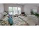 Bedroom with floral bedding, window, and white furniture at 601 N Hillside Dr. # 3634, North Myrtle Beach, SC 29582