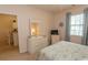 Bedroom with queen bed, dresser, and access to a small kitchenette at 601 N Hillside Dr. # 3634, North Myrtle Beach, SC 29582