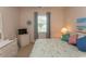 Comfortable bedroom with a queen bed, dresser, and flat-screen TV at 601 N Hillside Dr. # 3634, North Myrtle Beach, SC 29582
