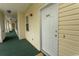 Exterior view of building showing hallway and apartment entrance at 601 N Hillside Dr. # 3634, North Myrtle Beach, SC 29582