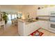Kitchen with granite countertop and white cabinets at 601 N Hillside Dr. # 3634, North Myrtle Beach, SC 29582