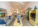 Spacious living area showcasing comfortable seating and a view into the kitchen and dining area at 601 N Hillside Dr. # 3634, North Myrtle Beach, SC 29582