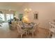 Living room with floral sofa and patio access at 601 N Hillside Dr. # 3634, North Myrtle Beach, SC 29582