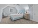 Cozy bedroom with light blue bed frame and calming atmosphere at 6025 Bolsena Place, Myrtle Beach, SC 29577