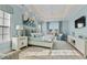 Spacious bedroom with a king-size bed and access to a private balcony at 6025 Bolsena Place, Myrtle Beach, SC 29577