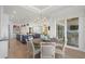 Bright dining area with a round table and chairs, adjacent to the kitchen at 6025 Bolsena Place, Myrtle Beach, SC 29577