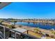Stunning water view from balcony, featuring neighborhood and landscaping at 6025 Bolsena Place, Myrtle Beach, SC 29577