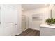 Modern bathroom with a walk-in shower, double vanity, and neutral color scheme at 688 Wallace Dr., Little River, SC 29566