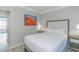Serene bedroom featuring a queen bed with nightstands and access to a private balcony at 7200 N Ocean Blvd. # 314, Myrtle Beach, SC 29572