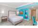 A bright condo bedroom with stylish furniture, beach-themed accents, and sleek, modern flooring at 7200 N Ocean Blvd. # 314, Myrtle Beach, SC 29572
