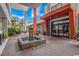 Inviting hotel entrance featuring a decorative water fountain, red support columns, and stone facade at 7200 N Ocean Blvd. # 314, Myrtle Beach, SC 29572