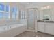 Elegant bathroom with soaking tub, shower, and window at 822 Farrow Pkwy., Myrtle Beach, SC 29577