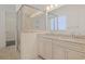 Bathroom boasts double sinks, granite countertops, and a glass shower at 822 Farrow Pkwy., Myrtle Beach, SC 29577