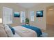 Bedroom with a queen-size bed and ocean-themed art at 822 Farrow Pkwy., Myrtle Beach, SC 29577