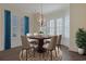 Elegant dining room with hardwood floors and a round dining table at 822 Farrow Pkwy., Myrtle Beach, SC 29577