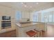 Modern kitchen with granite island, stainless steel appliances, and hardwood floors at 822 Farrow Pkwy., Myrtle Beach, SC 29577