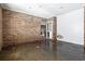 Unfinished basement with brick walls and concrete floors at 9095 Highway 701 South, Conway, SC 29527