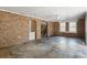 Unfinished basement with brick walls and concrete floors at 9095 Highway 701 South, Conway, SC 29527