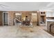 Unfinished basement with brick walls, a wood stove, and concrete floors at 9095 Highway 701 South, Conway, SC 29527