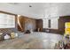 Unfinished basement area with brick walls and wood stairs at 9095 Highway 701 South, Conway, SC 29527