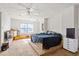 Large bedroom with a bed and window at 9095 Highway 701 South, Conway, SC 29527