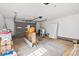 Attached garage with storage and an open door at 9095 Highway 701 South, Conway, SC 29527