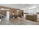 Kitchen with white cabinets, brick breakfast bar, and wood flooring at 9095 Highway 701 South, Conway, SC 29527