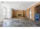 Spacious living room with a brick fireplace and large windows at 9095 Highway 701 South, Conway, SC 29527