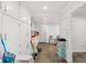 Large storage or workshop area with white cabinets and shelves at 9095 Highway 701 South, Conway, SC 29527