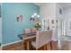 Charming dining area with an accent wall and hardwood floors at 92 Preservation Dr., Myrtle Beach, SC 29572