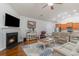 Spacious living room with fireplace and kitchen island view at 92 Preservation Dr., Myrtle Beach, SC 29572
