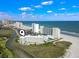 Beautiful aerial view of beachfront condos, waterway, ocean, and beach access at 9400 Shore Dr. # 311, Myrtle Beach, SC 29572
