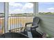 Relaxing balcony seating area with views of marsh, Intracoastal Waterway, and coastline at 9400 Shore Dr. # 311, Myrtle Beach, SC 29572