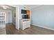 Bedroom featuring bunkbeds and a wall mounted TV at 9400 Shore Dr. # 311, Myrtle Beach, SC 29572