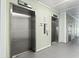 Condo elevators featuring a smoke free sign at 9400 Shore Dr. # 311, Myrtle Beach, SC 29572