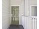 Front door to condo unit featuring a door with seashell decoration at 9400 Shore Dr. # 311, Myrtle Beach, SC 29572