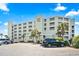 Close-up of Sands Beach Club condos in Myrtle Beach, South Carolina, surrounded by lush landscaping at 9400 Shore Dr. # 311, Myrtle Beach, SC 29572