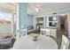 Open living area with table, chairs, and bunk beds at 9400 Shore Dr. # 311, Myrtle Beach, SC 29572
