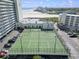 Aerial shot of well-maintained tennis courts located near the beach, parking and condos at 9400 Shore Dr. # 311, Myrtle Beach, SC 29572